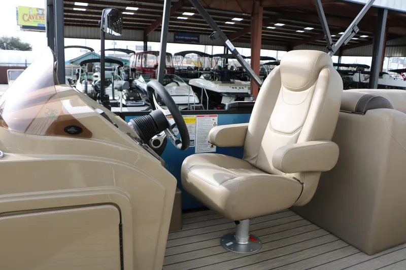 Slide: The Image of Captain's chair and helm of 2026 Sylvan Mirage 822 LZ pontoon boat. - 25