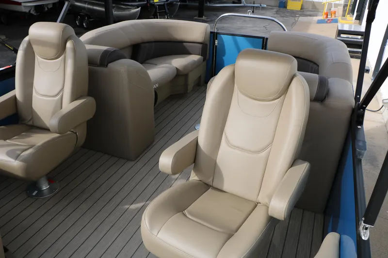 Slide: The Image of Luxurious seating on 2026 Sylvan Mirage 822 LZ pontoon boat, featuring beige leather upholstery. - 27