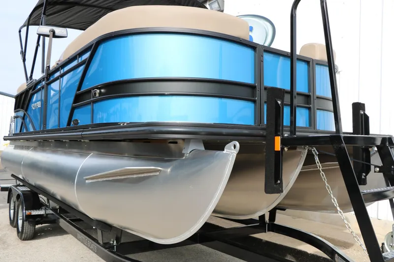 Slide: The Image of 2026 Sylvan Mirage 822 LZ pontoon boat on trailer, featuring sleek blue design. - 4