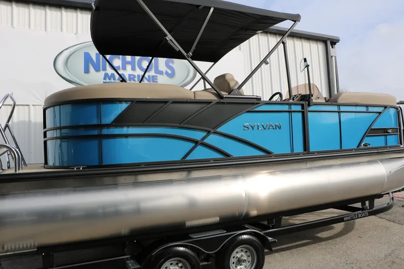 Slide: The Image of 2026 Sylvan Mirage 822 LZ pontoon boat in vibrant blue at Nichols Marine. - 8