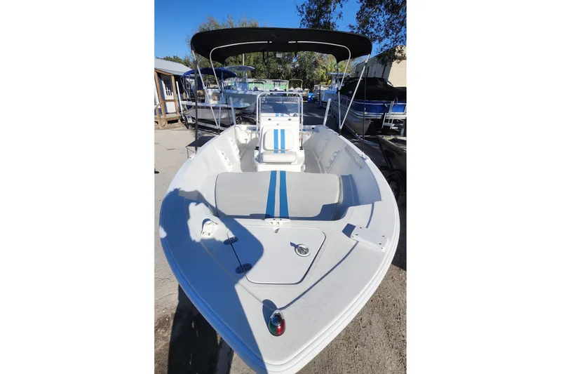 Slide: The Image of 2018 Glasstream 17 CCR boat with canopy, docked outdoors. - 14