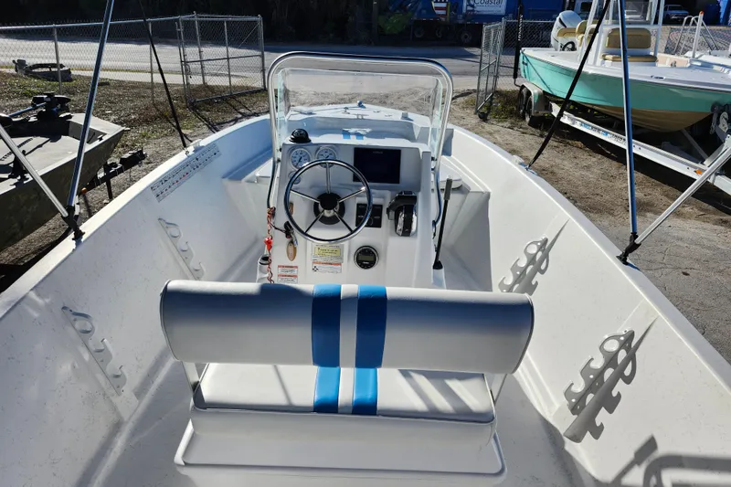 Slide: The Image of 2018 Glasstream 17 CCR boat interior with steering wheel and seating. - 30