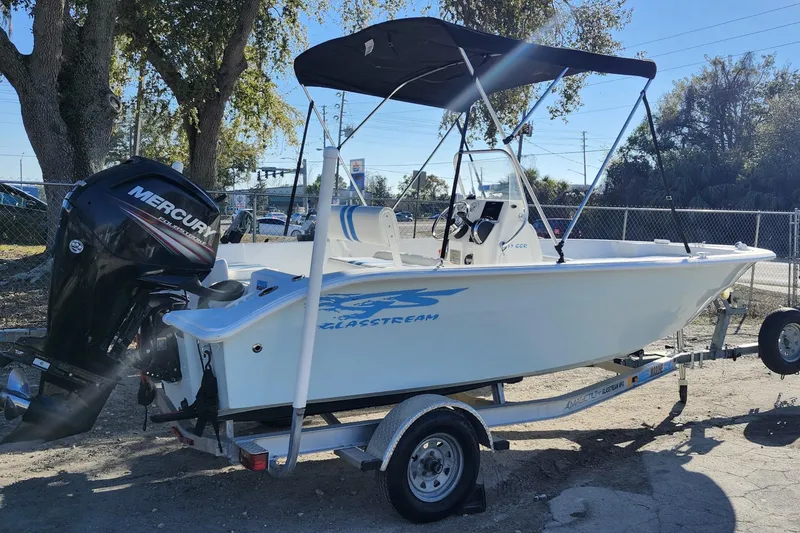 Slide: The Image of 2018 Glasstream 17 CCR boat with Mercury engine on trailer, parked outdoors. - 6