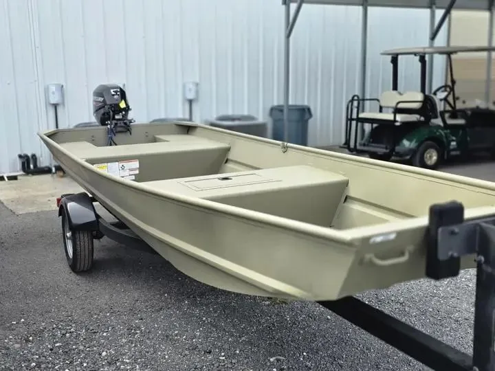 Slide: The Image of 2026 Tracker Grizzly 15 Jon boat on trailer, exterior view. - 6