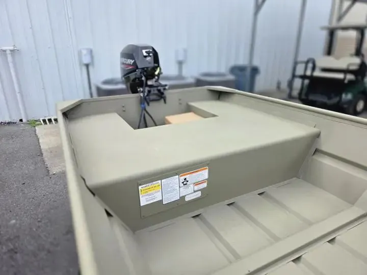 Slide: The Image of Tracker Grizzly 15 Jon boat 2026 with outboard motor. - 9