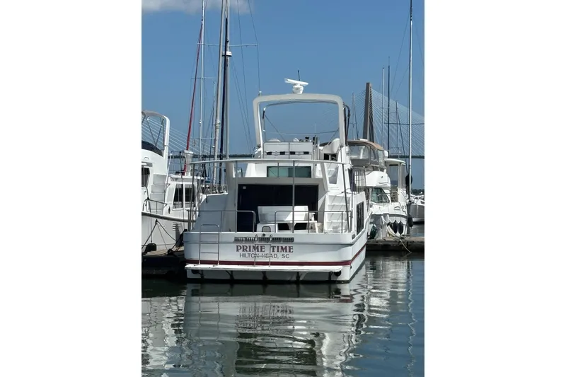 Slide: The Image of 1994 Harbor Master 52 Coastal Cruiser Upper Helm with 3 swivel chairs - 2