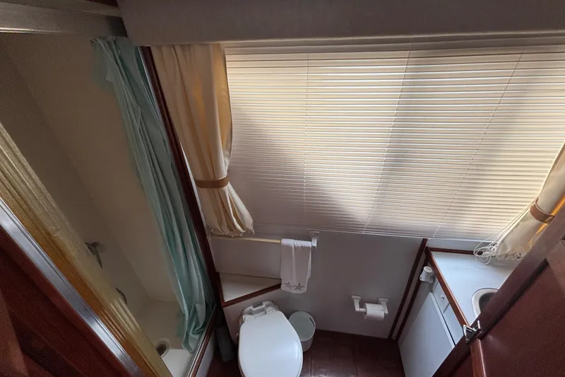 Slide: The Image of 1994 Harbor Master 52 Coastal Cruiser Guest/Day Head with Shower Stall - 28