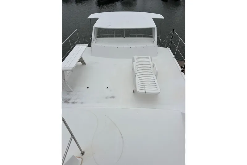 Slide: The Image of 1994 Harbor Master 52 Coastal Cruiser Upper Sun Deck looking aft - 7
