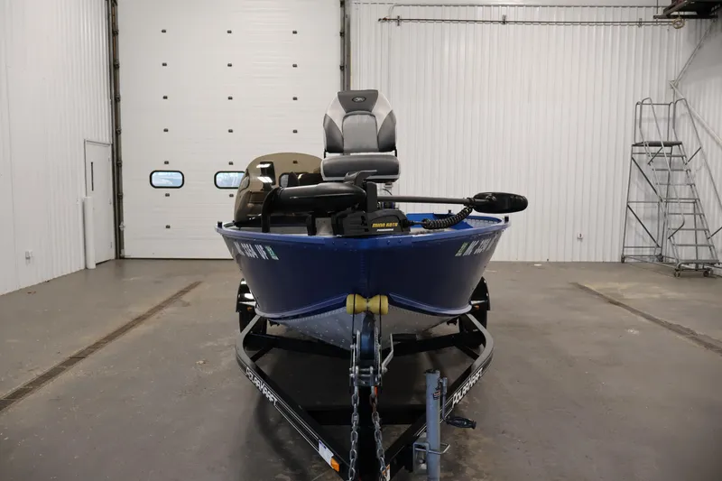 Slide: The Image of 2017 Polar Kraft Outlander 156 SC boat in a garage, front view. - 2