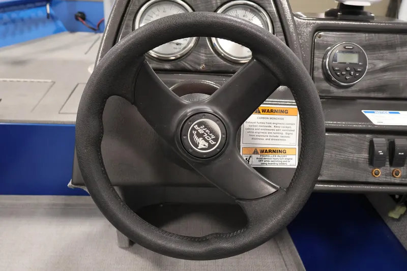 Slide: The Image of Steering wheel and dashboard of 2017 Polar Kraft Outlander 156 SC boat. - 21