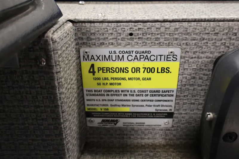 Slide: The Image of 2017 Polar Kraft Outlander 156 SC capacity label, 4 persons or 700 lbs, 50 HP motor. - 26