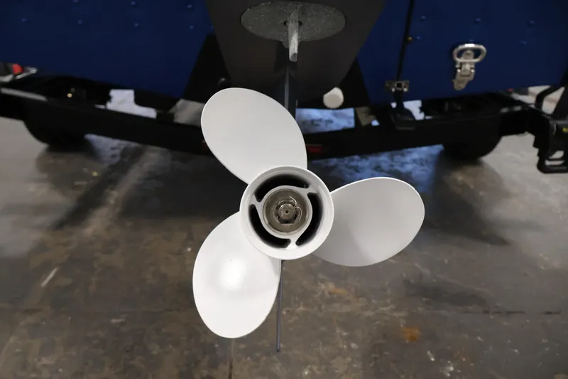 Slide: The Image of 2017 Polar Kraft Outlander 156 SC boat propeller in a garage setting. - 33