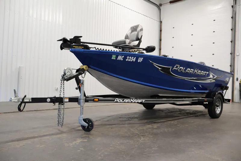 Slide: The Image of 2017 Polar Kraft Outlander 156 SC boat on trailer in indoor setting. - 35
