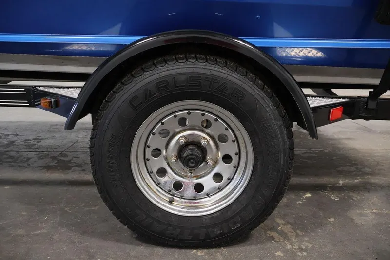 Slide: The Image of Trailer wheel of 2017 Polar Kraft Outlander 156 SC boat, featuring Carlstar tire. - 40