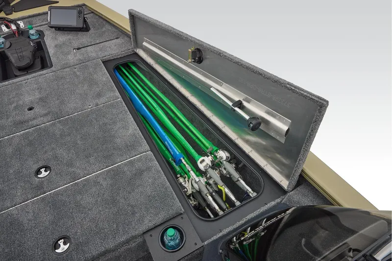 Slide: The Image of Manufacturer Provided Image: 2026 Tracker Pro Team 195 boat with open storage compartment and fishing rods. - 28