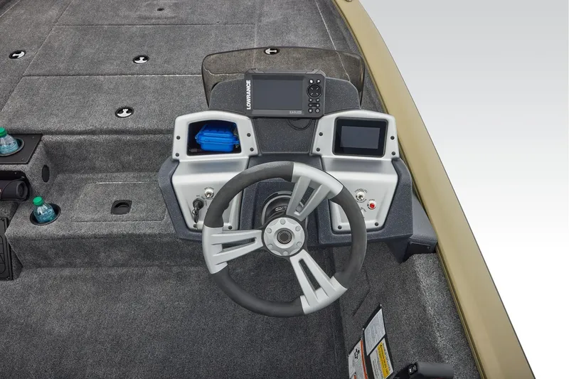 Slide: The Image of Manufacturer Provided Image: 2026 Tracker Pro Team 195 boat dashboard with steering wheel and electronic displays. - 40