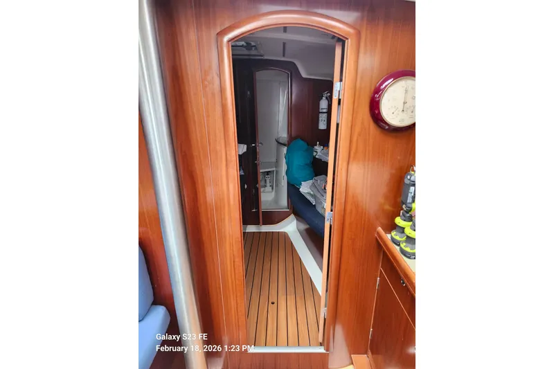 Slide: The Image of Interior view of 2005 Beneteau Oceanis Clipper 393 sailboat with wooden finish. - 11