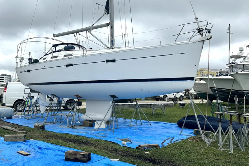 Slide: The Image of 2005 Beneteau Oceanis Clipper 393 sailboat on stands, undergoing maintenance. - 20