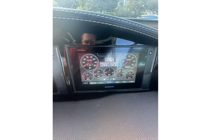 Slide: The Image of Dashboard of a 2021 Cobalt R3 with Garmin GPS display. - 18