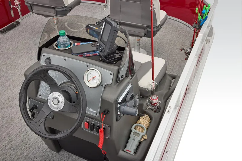 Slide: The Image of Manufacturer Provided Image: 2026 Sun Tracker Bass Buggy 16 XL Select boat console with steering wheel and fishing gear. - 54