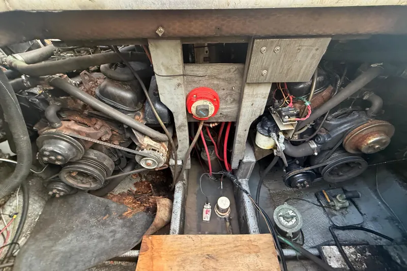 Slide: The Image of Engine compartment of 1986 Chris-Craft 336 Commander with visible components and wiring. - 5