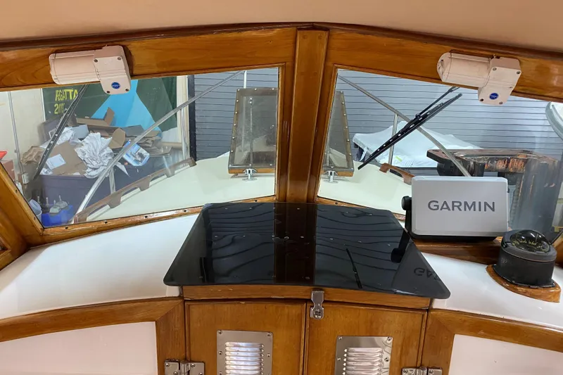 Slide: The Image of Interior view of a 1997 Wasque C.W.Hood Wasque 26 boat with Garmin navigation system. - 5