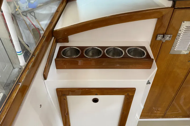 Slide: The Image of Interior of 1997 Wasque C.W.Hood Wasque 26 boat with wooden cup holders. - 8