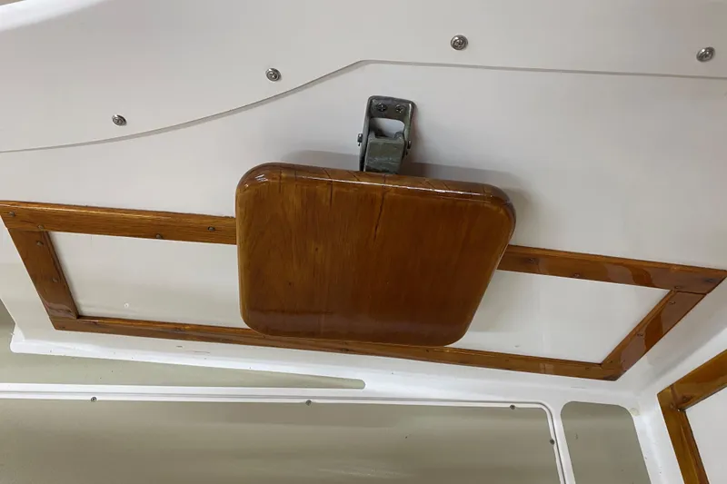 Slide: The Image of 1997 Wasque C.W. Hood Wasque 26 boat interior with wooden hatch detail. - 9