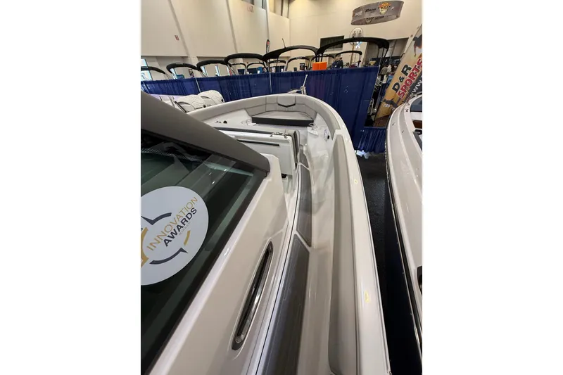 Slide: The Image of 2026 Monterey Elite 25 OB boat displayed at an innovation awards event. - 10