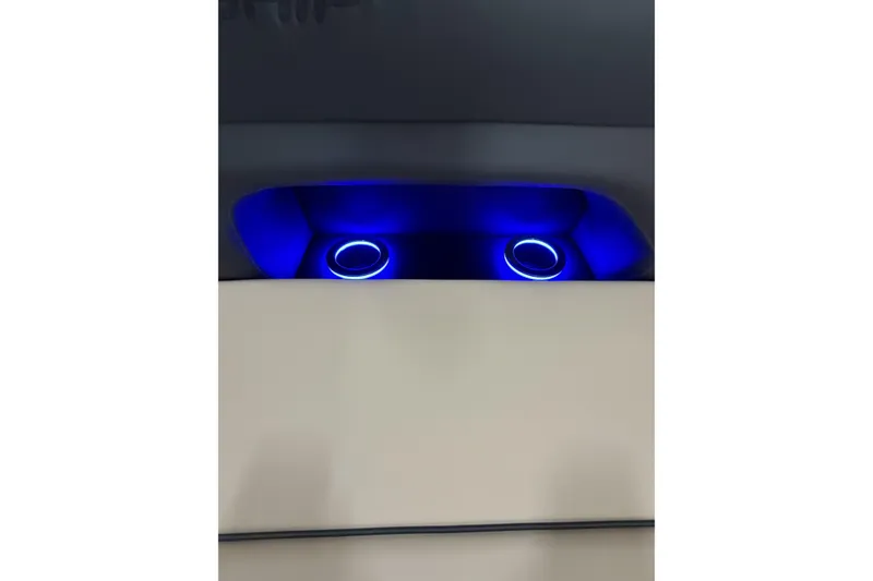 Slide: The Image of Illuminated cup holders in 2026 Flagship D22RF Ext. Deck, featuring blue LED lighting. - 15