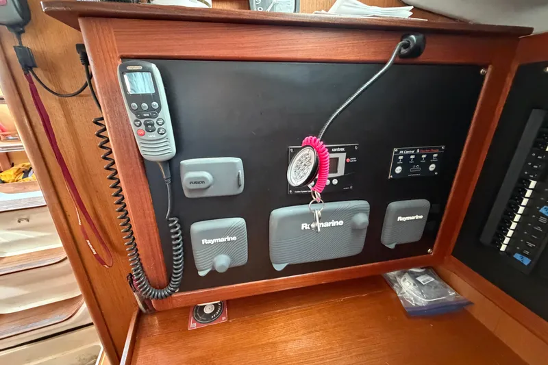 Slide: The Image of Control panel of a 1999 Hunter 380 sailboat with Raymarine equipment. - 13