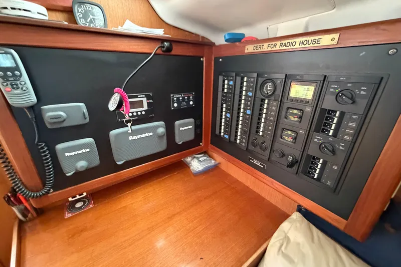 Slide: The Image of Control panel of a 1999 Hunter 380 sailboat with Raymarine equipment. - 23