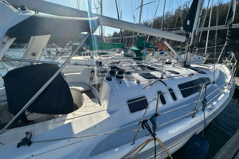 Slide: The Image of Sailboat docked in marina, 1999 Hunter 380 model, sunny day. - 6