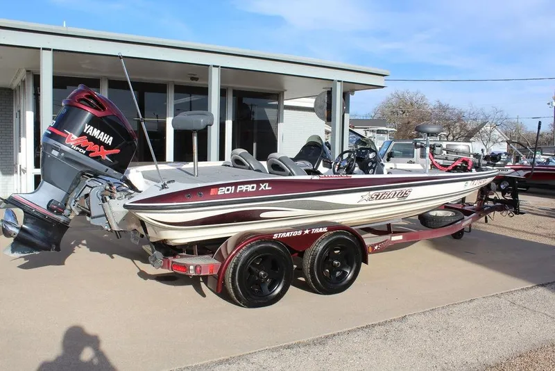 Slide: The Image of 2005 Stratos 201 Pro XL boat with Yamaha VMAX engine on trailer. - 11