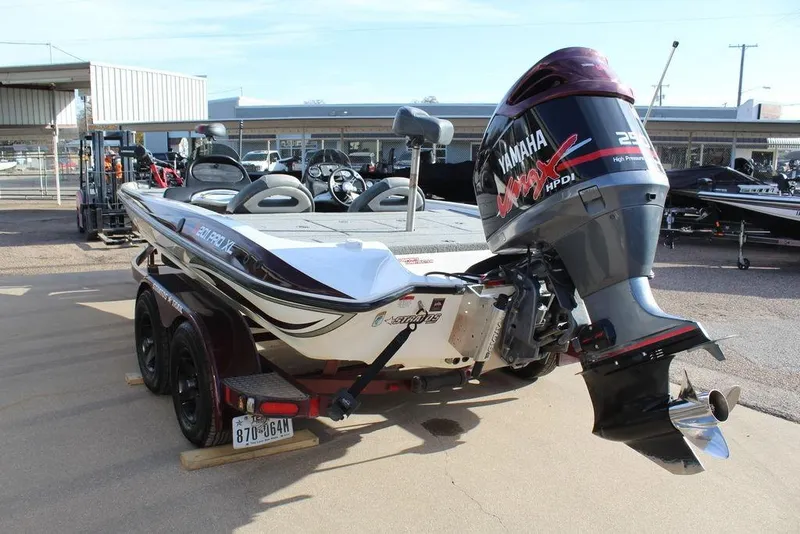 Slide: The Image of 2005 Stratos 201 Pro XL boat with Yamaha outboard motor on trailer. - 14