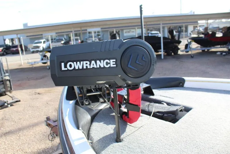 Slide: The Image of Lowrance device on 2005 Stratos 201 Pro XL boat, outdoor setting. - 9