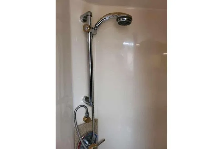 Slide: The Image of Shower fixture in 2005 Luhrs 41 Convertible boat bathroom. - 18