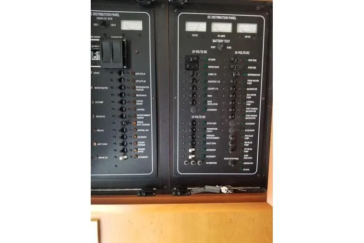 Slide: The Image of Electrical panel of 2005 Luhrs 41 Convertible boat, showing DC distribution controls. - 20