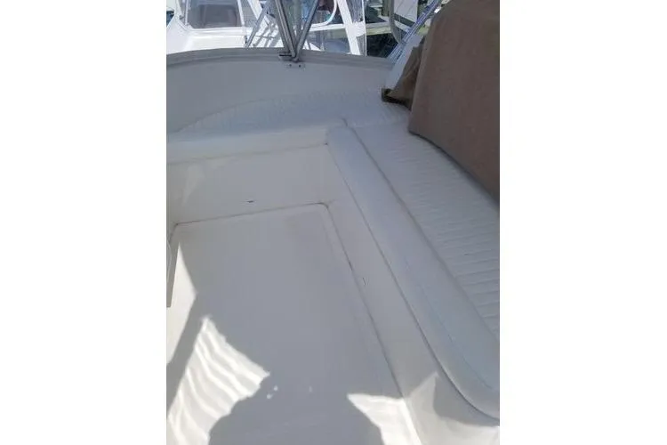 Slide: The Image of 2005 Luhrs 41 Convertible boat interior with seating and deck area. - 31