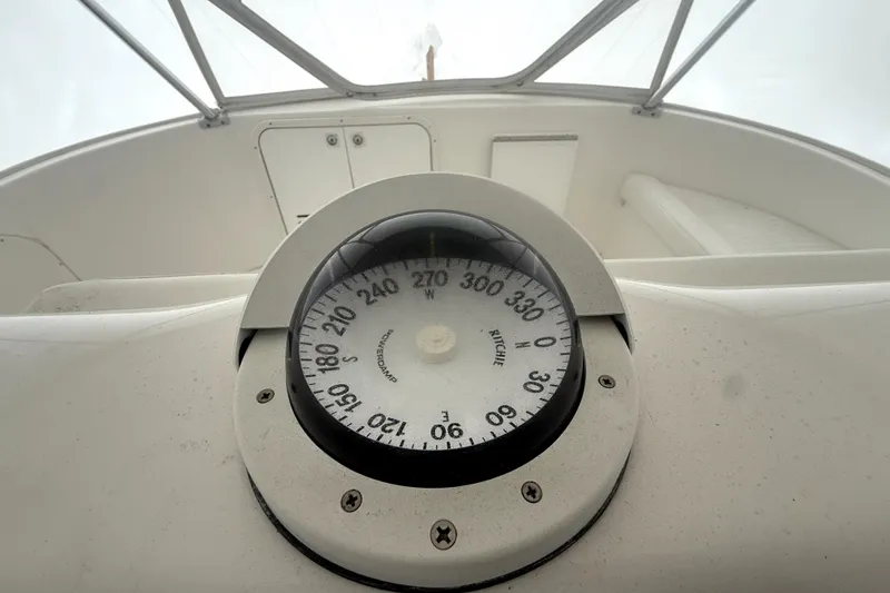 Slide: The Image of Compass on 2004 Luhrs 41 Convertible boat dashboard, showing navigation details. - 40