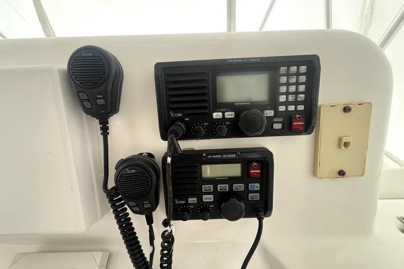 Slide: The Image of 2004 Luhrs 41 Convertible boat radio equipment with Icom VHF marine radios. - 45