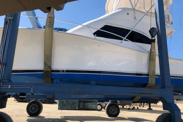 Slide: The Image of 2005 Luhrs 41 Convertible yacht on a trailer, side view. - 5