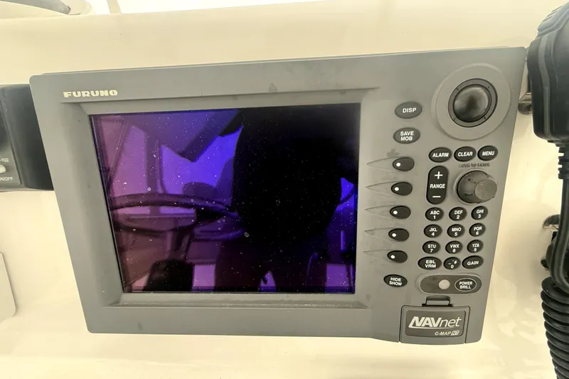Slide: The Image of Furuno NAVnet marine display on 2004 Luhrs 41 Convertible boat dashboard. - 50
