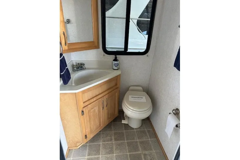 Slide: The Image of Covered grill on 2008 Destination Yachts 45X14, labeled "Regatta Queen." - 11