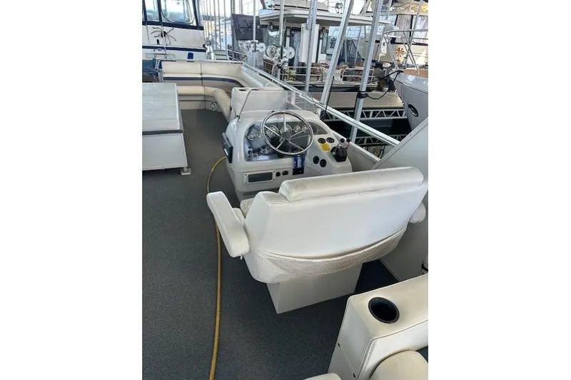 Slide: The Image of 2008 Destination Yachts 45X14 with slide, docked on calm water. - 14