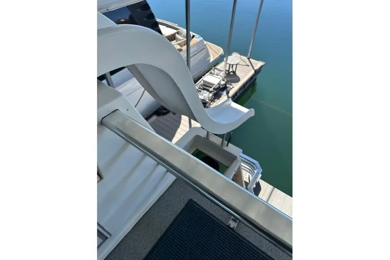 Slide: The Image of Staircase on 2008 Destination Yachts 45X14, leading to lower deck with railing. - 16