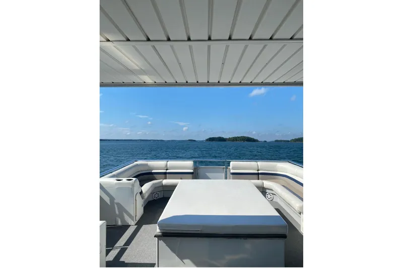 Slide: The Image of 2008 Destination Yachts 45X14 boat interior with lake view and seating area. - 30