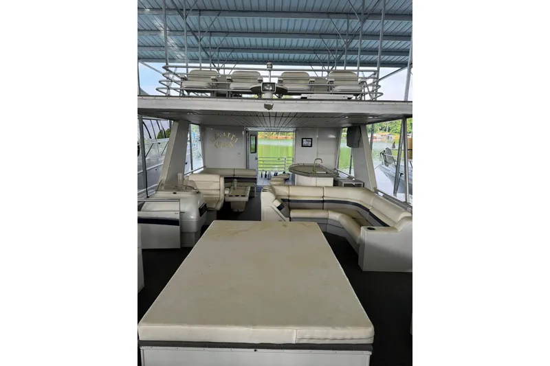Slide: The Image of 2008 Destination Yachts 45X14 interior with seating and upper deck view. - 33