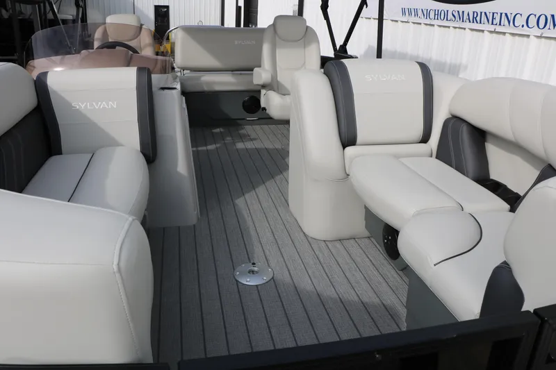 Slide: The Image of 2025 Sylvan MIRAGE 822 CLZ DH pontoon boat interior with luxurious seating. - 10