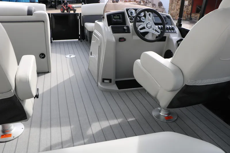 Slide: The Image of Interior of 2025 Sylvan MIRAGE 822 CLZ DH boat with modern helm and seating. - 19